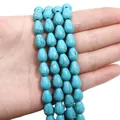 Polished bright blue teardrop synthetic turquoise beads with brown marble texture - Teardrop Shape / 8x11mm (Approx. 34 pcs/Strand) / Marbled Sky Blue