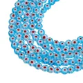 Light blue Millefiori glass beads with floral patterns for DIY jewelry making - Blue