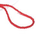 Perles de verre rouges translucides pour bijoux faits main avec surface ronde polie - Rouge Agate