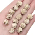 Perline in acrilico bianco crema con incisione a rosa e dettagli oro per gioielli - Perlina Tonda Rosa Bifacciale