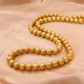 Elegant gold round faux pearl strand necklace on soft orange satin background - 8mm (30 Pcs/Pack) / Light Coffee