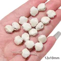 Creamy white shell-shaped ceramic beads for DIY jewelry measuring 12x10mm in hand - Shell (BCD019)