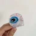 Molla per capelli a forma di bulbo oculare con iride blu e venature rosse su acetato - Occhio Blu
