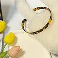 Cerchietto sottile con motivo tartarugato in acetato pregiato con finitura marrone vintage - Tartarugato scuro
