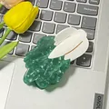Tulip shaped hair claw clip with green marble acetate and white petal design - Cabbage
