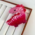 Creative pink dinosaur hair claw clip with acetate marble texture for women's hairstyling - Diplodocus