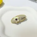 Elegant cream acetate oval hair clip with pearlescent flower and purple rhinestone detail - 4.5CM / Oval Champagne