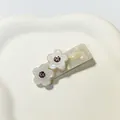 Fermaglio in resina color crema con fiori di cristallo viola e logo artigianale - 5cm / Fiore Bianco Sirena