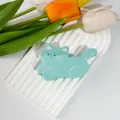 Detail of light blue acetate cat claw clip with white accents on white background - 9.5cm x 5.5cm / Cat / Lake Blue