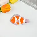 Vibrant clownfish hair claw clip with orange and white stripes for ocean style hair styling - Clownfish