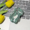 Cute green acetate hair claw clip with cartoon monster design and marbled texture - Dinosaur Style / Green