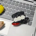 Chic hat-shaped hair claw in marble acetate with white roses on a silver laptop - Black Hat