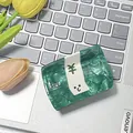 Creative money-shaped hair claw in green marble acetate with yen and 100 motifs - 5774993530438 / Green Dollar Sign