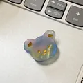 Mini-Handyhalter aus Acetat als bunter Bär mit Regenbogen-Verlauf und goldenen Details - 3cm / Irisierendes Blaugrün