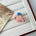 Pink whale acetate hair claw with blue bow and marble texture in display box - Mini Pink Whale