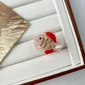 Mini acetic acid fish hair clip with pearlescent white body and red fin accents - Mini Mermaid Pink Tropical Fish