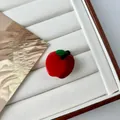 Mini red apple shaped hair clip made of glossy acetate with green leaf and black stem detail - Mini Red Apple