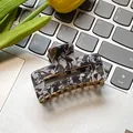 Square acetate hair claw with vintage marble pattern and gold metal teeth detail - Black and White Floral 6cm