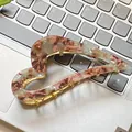 Haarklammer aus marmoriertem Acetat in Herzform mit goldenem Metallrahmen - Grünlich-brauner Blumendruck 115 Cm