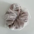 Detail of double-layered mesh scrunchie with pink satin core and white organza texture - Pink