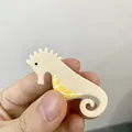Pince à cheveux fantaisie en forme d'hippocampe en acétate crème et jaune - Style Hippocampe