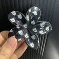 Détail de la pince à cheveux en forme de fleur avec motifs de fantômes pour Halloween - Lettre G / ABS