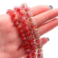Faceted red glass wheel bead with internal rose floral pattern for DIY jewelry crafts - Red