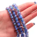Sky blue faceted glass beads with purple roses and gold glitter for DIY jewelry - Sapphire Blue