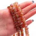 Faceted amber glass wheel beads with internal rose pattern for DIY jewelry making - Light Coffee