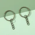 Gouden ijzeren sleutelhangerring met ketting van 4 schakels en gehamerde textuur voor DIY - 2.5cm Reliëf Sleutelring met Enkele Ring (10 Stuks/Verpakking) / Antiek Brons