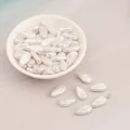 Waterdrop-shaped imitation pearl beads in white for DIY jewelry and earring making - Long Flat Bean Style / 10 Pcs/Pack (9x16mm)