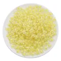 Pale yellow acrylic star beads for DIY jewelry making neatly placed in a round dish - 30g/Pack (Approx. 83 Pcs, 11x11.5mm) / Transparent Yellow Star