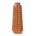 Metallic embroidery thread in red and yellow gold on a conical spool with pink cap - Gold/Red Mix