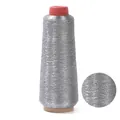Metallic silver embroidery thread on a wooden spool with a detailed texture close-up - 17cmx6cm (Approx 3250m/Roll) / Silver