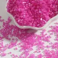 Pinkish purple 2mm iridescent glass bugle beads in a decorative ceramic dish - 2mm (15g/Pack) / Rose Red