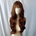 Long wavy reddish-brown synthetic wig with bangs on a professional white model stand - Tan