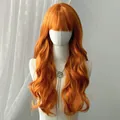 Long wavy orange wig with bangs and vibrant curls on a white mannequin torso - Orange