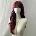 Close-up of long wavy burgundy wig with bangs on a mannequin with butterfly necklace - Burgundy