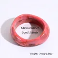 Dettaglio delle dimensioni e del peso di questo largo bracciale rigido in resina rosa - Rosa