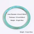 Detalle de dimensiones del brazalete de resina marmoleada azul con medidas de peso y talla - Degradado Azul-Verde