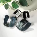 Elegant C-shaped acrylic earrings with blue-silver marble texture and black studs - Deep Blue Water Pattern (EH00064)