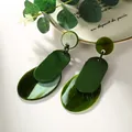 Three-tiered dark green geometric earrings with marble texture resin and oval drop pendants - Olive Green