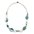 Detail of geometric acrylic resin necklace with marble pattern and gold metal rings - Blue Marbled