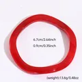 Translucent red resin twisted bangle with irregular design and precise size measurements - Irregular Style (30#)
