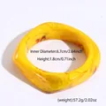 Translucent yellow resin oval bangle with amber texture and 6.7cm inner diameter - Square Style (48#)