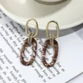 Boucles d'oreilles géométriques en résine écaille de tortue marron et métal doré - Style Ovale Fragment Blanc Café (EH00125)
