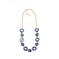 Minimalist acrylic ring necklace with interlocking blue resin charms and golden chain - Sapphire Blue