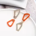 Boucles d'oreilles géométriques en résine orange avec cadre doré et strass brillants - Style Trapèze Géométrique Orange (EH00157)