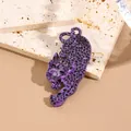 Purple leopard acrylic brooch with black spots on a beige decorative stone base - Dark Purple