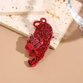 Trendy red acrylic cheetah brooch with black leopard spots in a crouching pose - Magenta